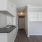 a kitchen with white cabinets
