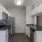 a kitchen with white cabinets