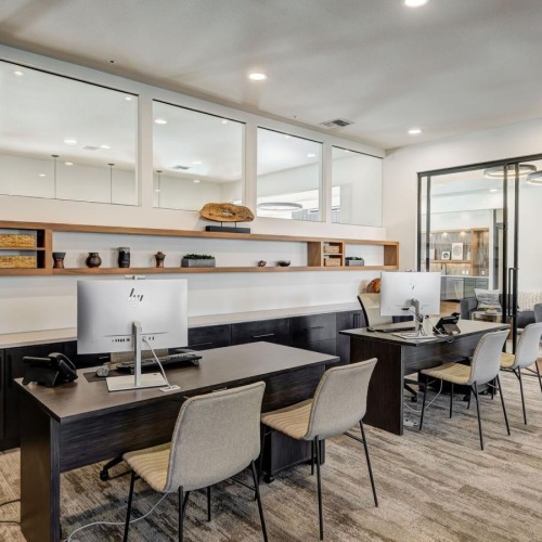 Enjoy our resident-only features a large kitchen with a bar and chairs
