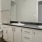 a bathroom with a marble countertop