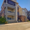 a building with a stone wall