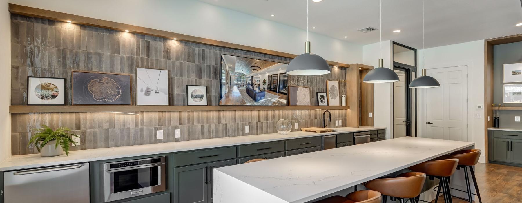 a kitchen with a table and chairs